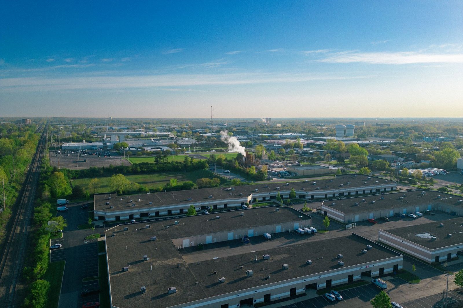 Aerial view of low-rise multi-unit industrial buildings in an industrial park